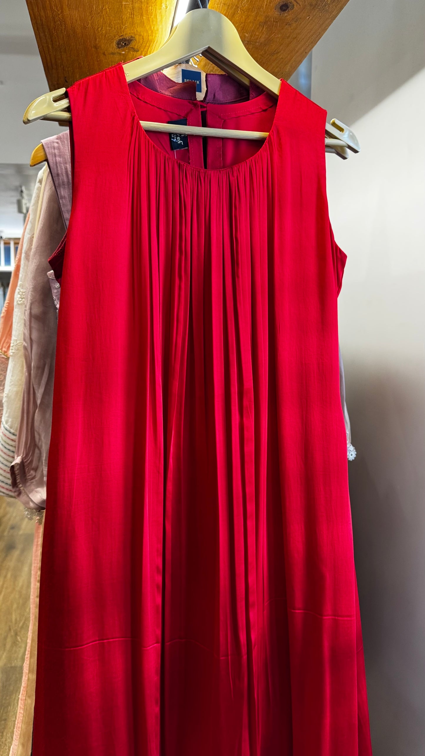 Red satin sleeveless dress Sale price rs 1360, was rs 1600