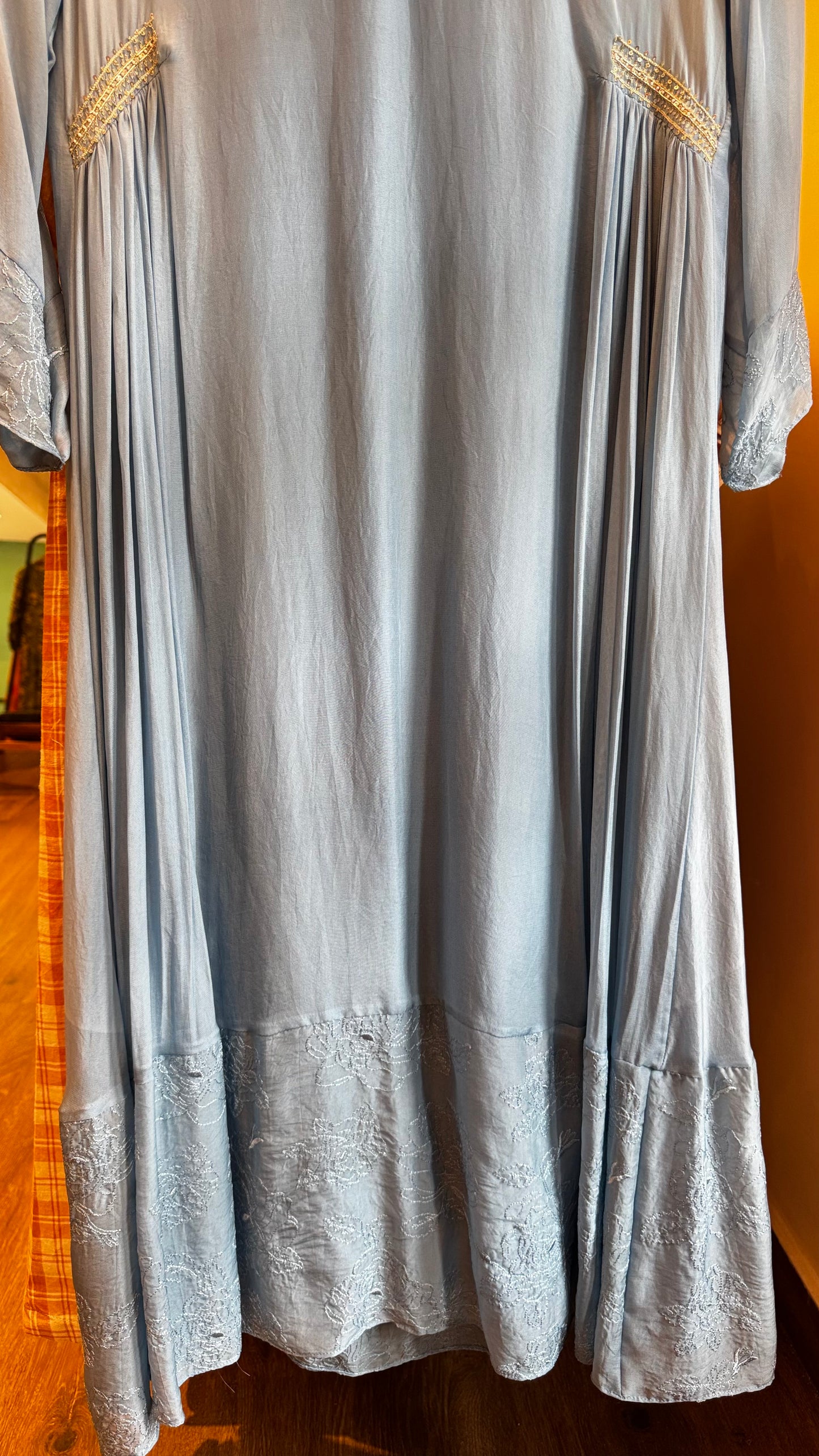 Powder blue soft organza dress with handwork on sides size- 38