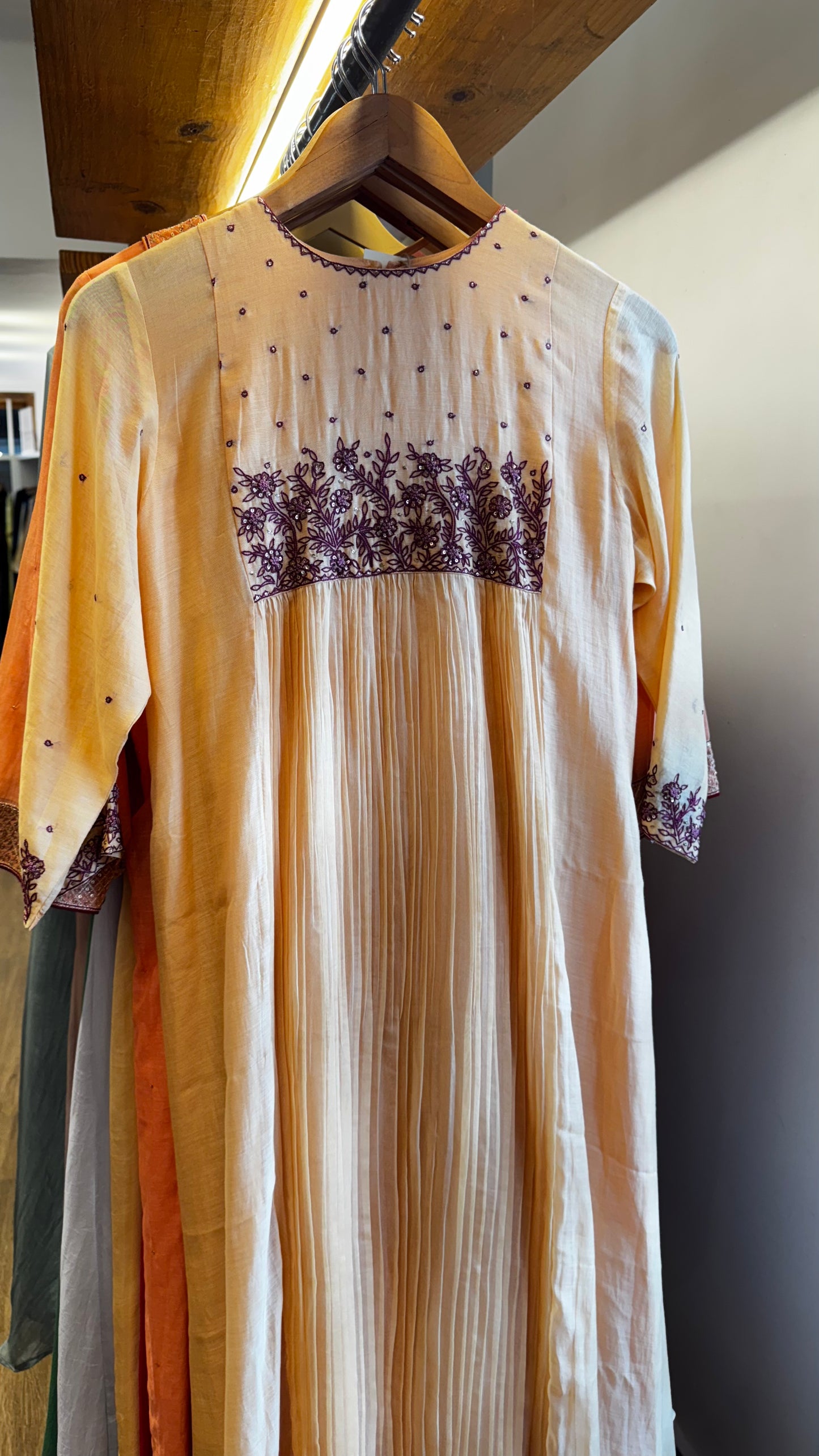 Dark cream colour embroidered yoke with a v neckline size M ₹6165