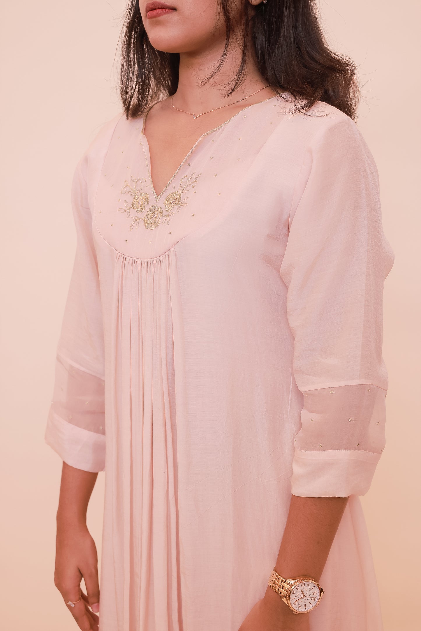 Light pastel pink with gold thread embroidery on yoke