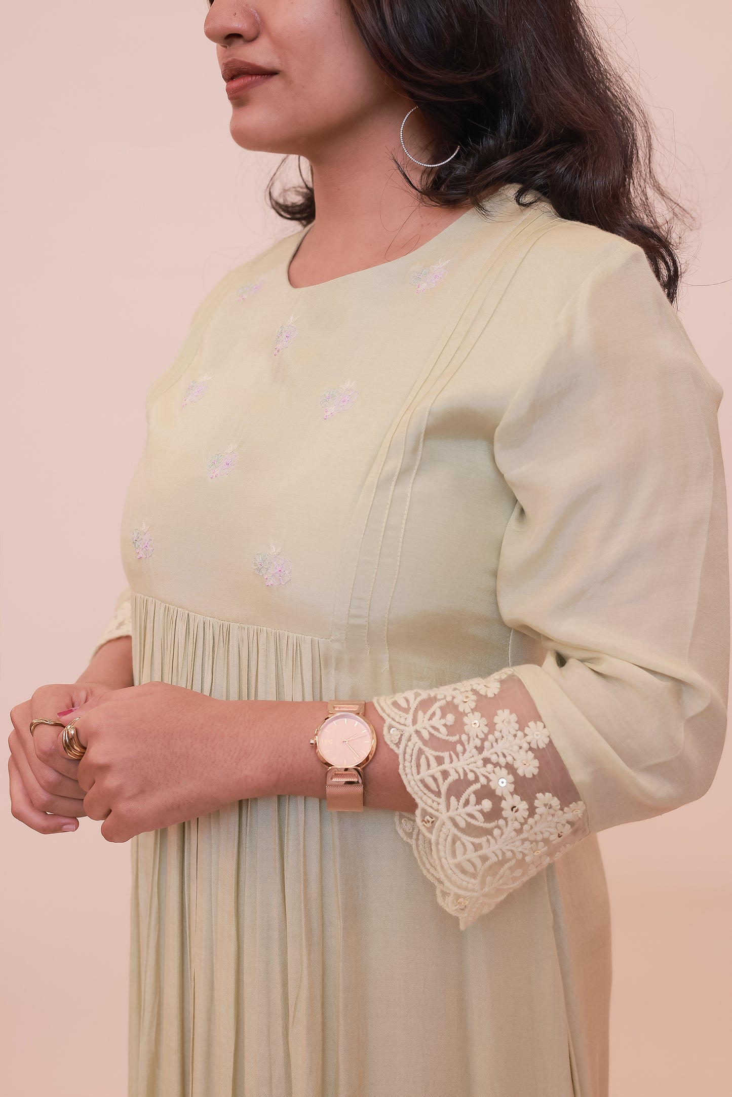 Light pastel green pleated dress with lace