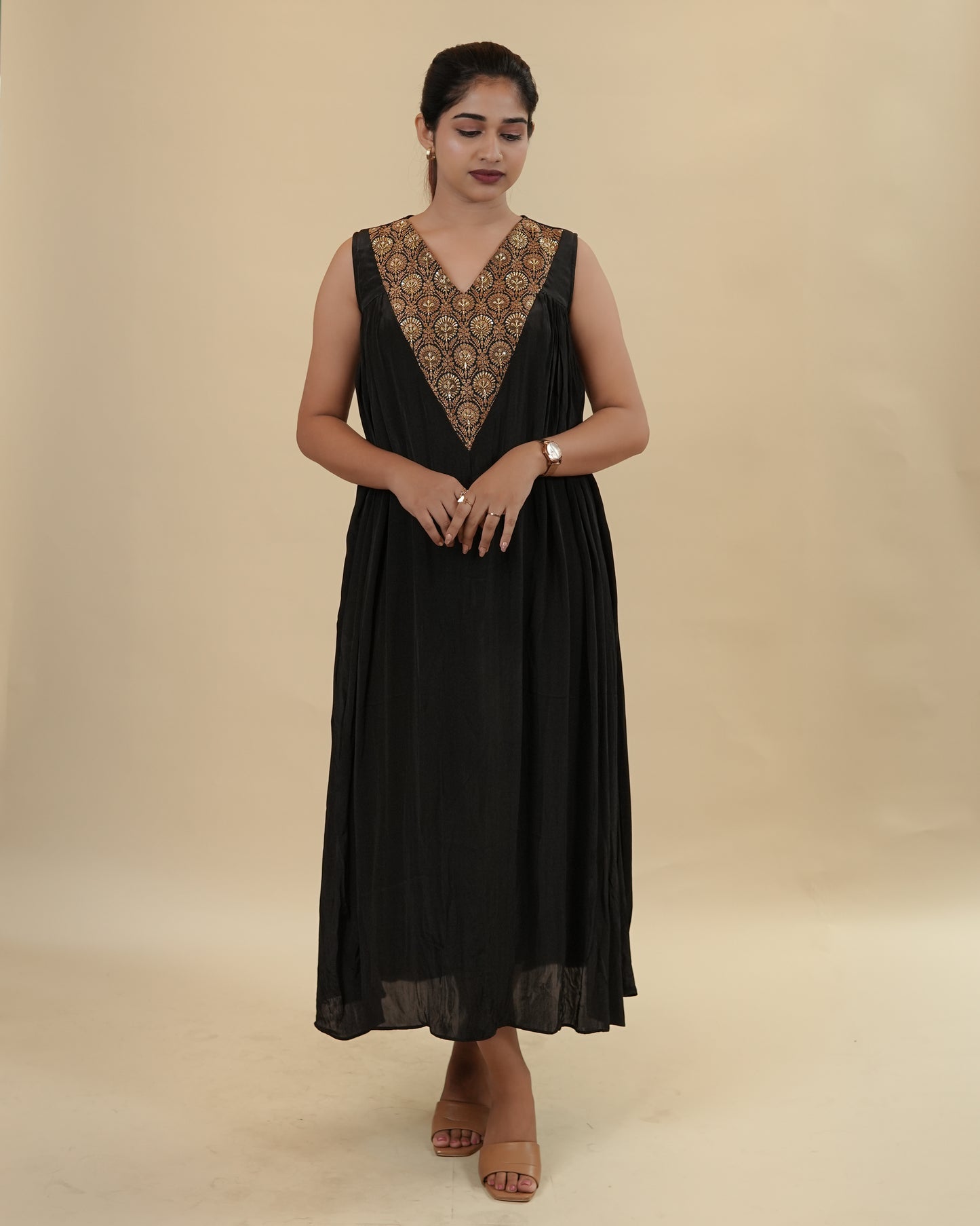 Elegant Black Dress with Embellished Neckline