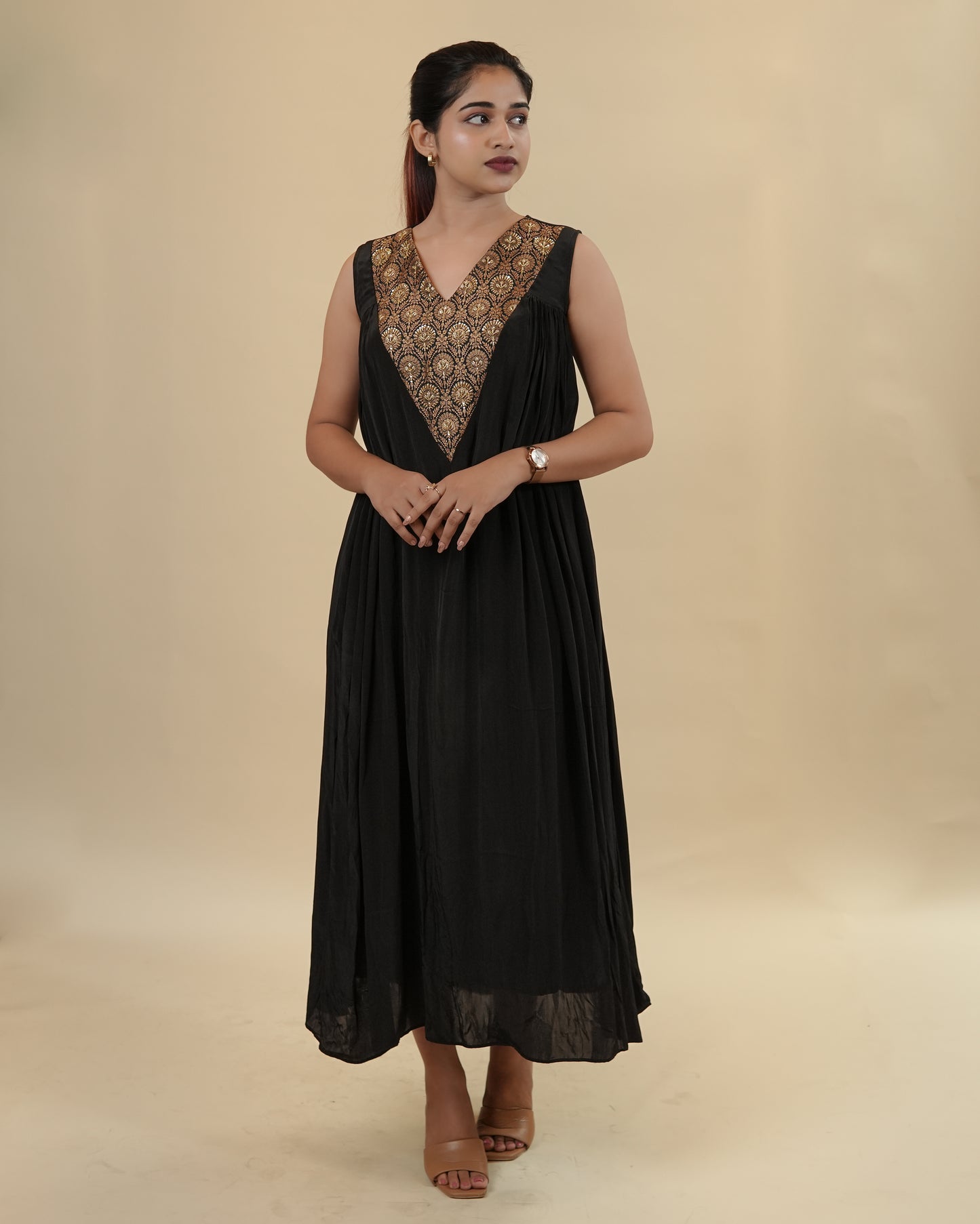 Elegant Black Dress with Embellished Neckline