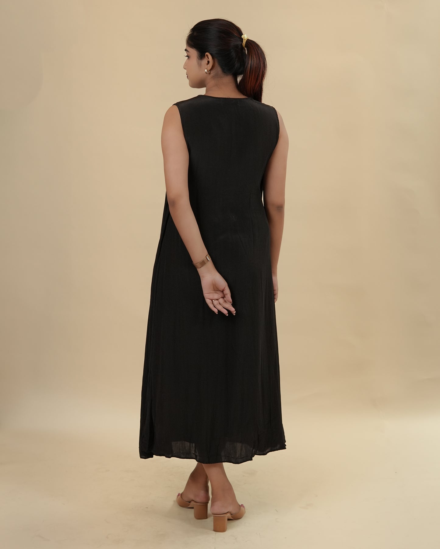 Elegant Black Dress with Embellished Neckline