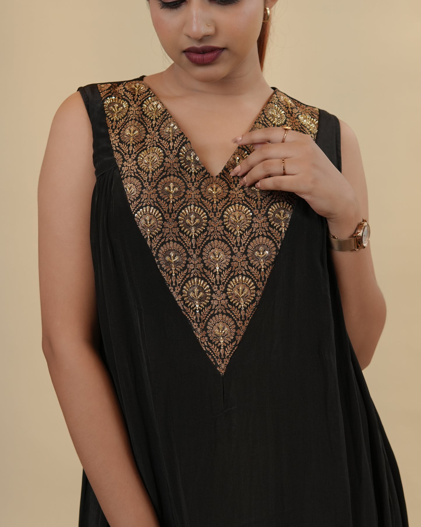 Elegant Black Dress with Embellished Neckline