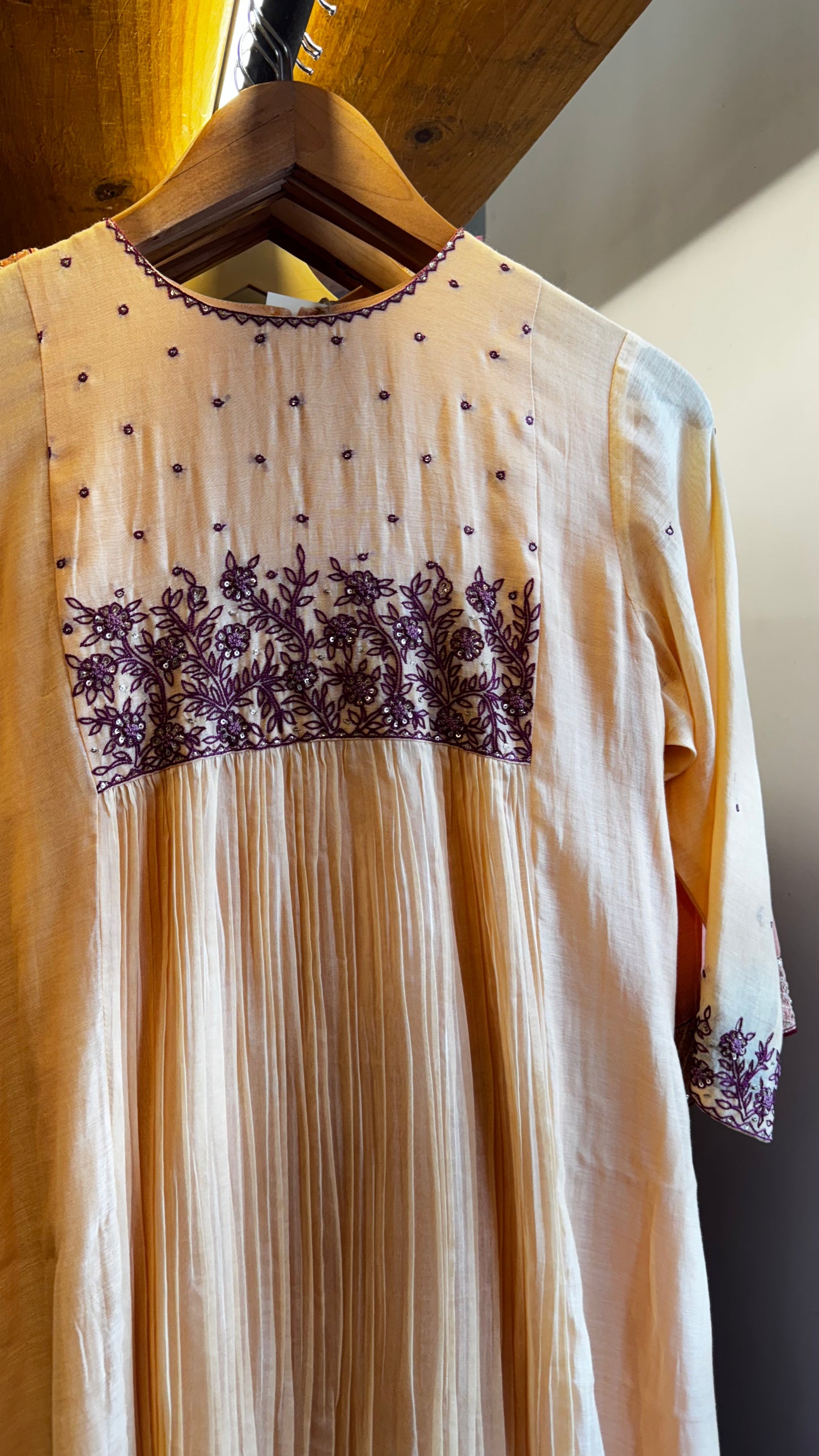 Dark cream colour embroidered yoke with a v neckline size M ₹6165