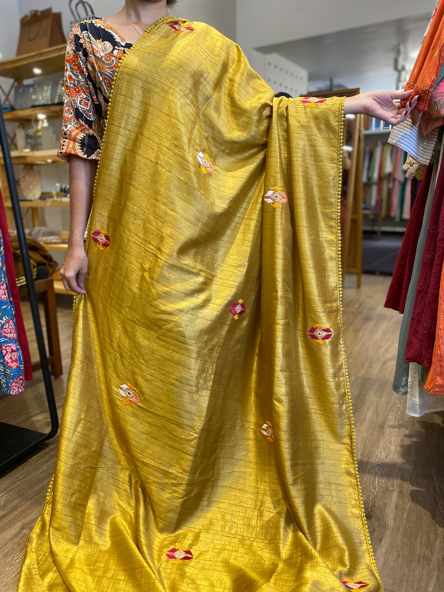 Golden yellow Tussar silk saree with heavy handwork embroidery all over & heavy pallu with mirror work