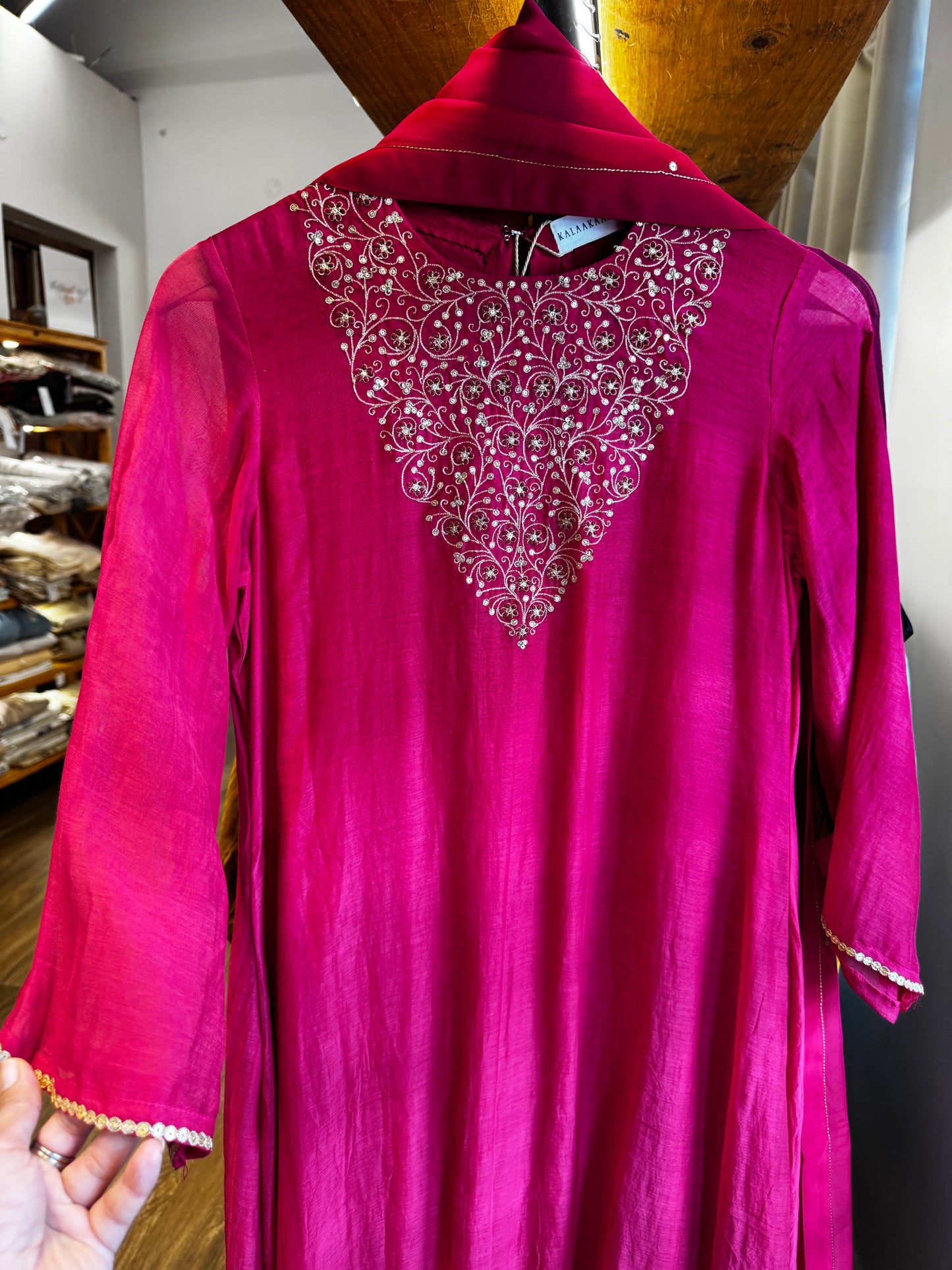 Pink with gold and pink zari , V shaped embroidered yoke, dress with dupatta